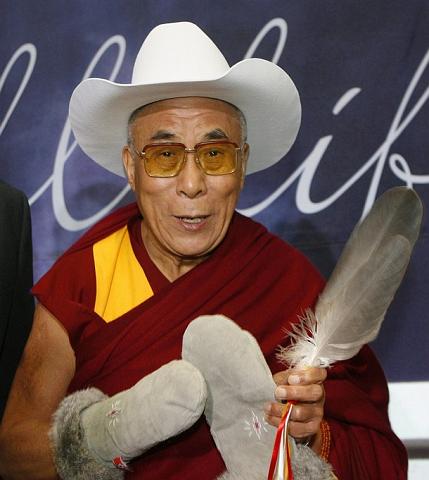 
Dalai Lama With White Cowboy hat And Mittens In Calgary, Canada September 30, 2009
